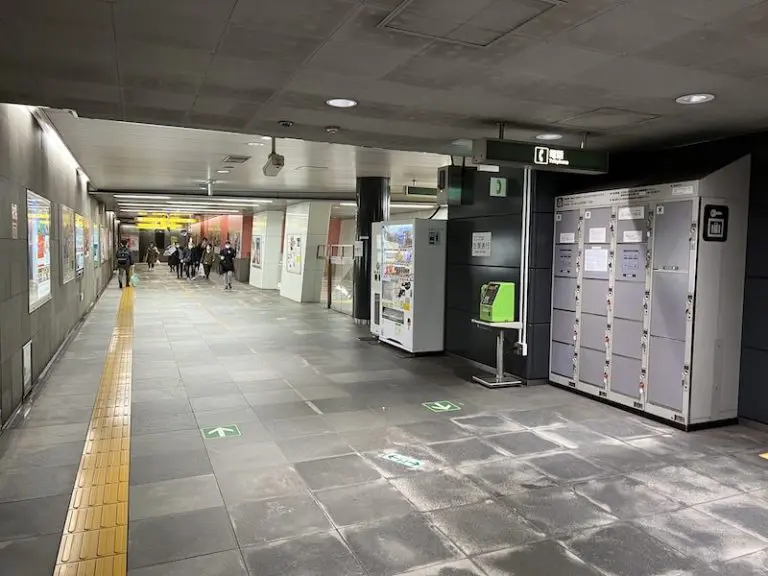There are coin lockers past the ticket office.
