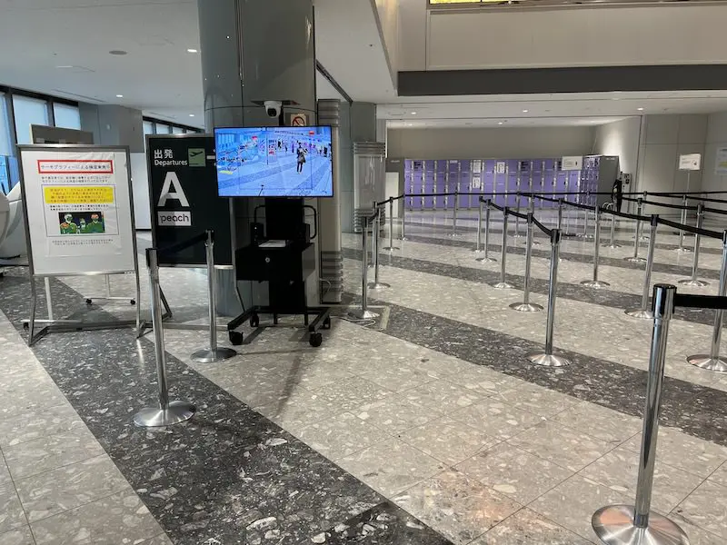 Coin-operated lockers next to Gate A for boarding Peach flights.
