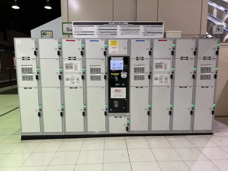 Coin lockers at [central gate 73] facing the front of the corridor