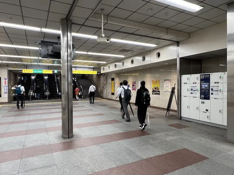 Opposite side. The three escalators on the left are Exit A1, which leads directly to the JR Central Exit on the second floor. The single escalator and stairs on the right are Exit A2, which leads to the ground level.