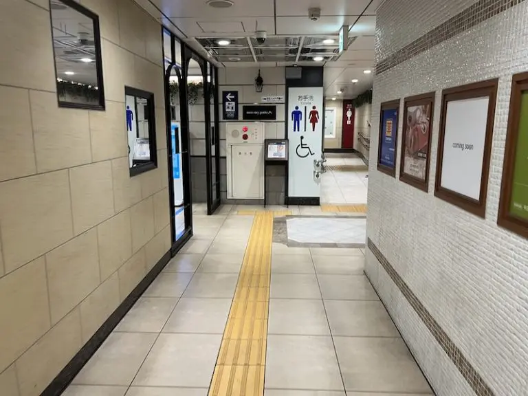 Continue on down the passageway to the restrooms.