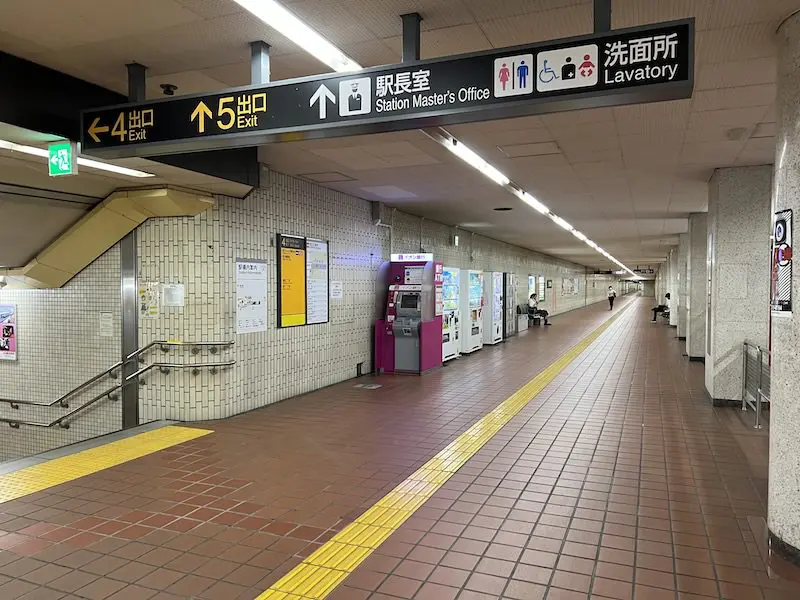 Coin lockers can be seen behind the drinking water vending machine in the corridor leading to Exit 5.